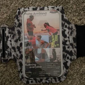 Phone Armband. Animal print. Brand new.